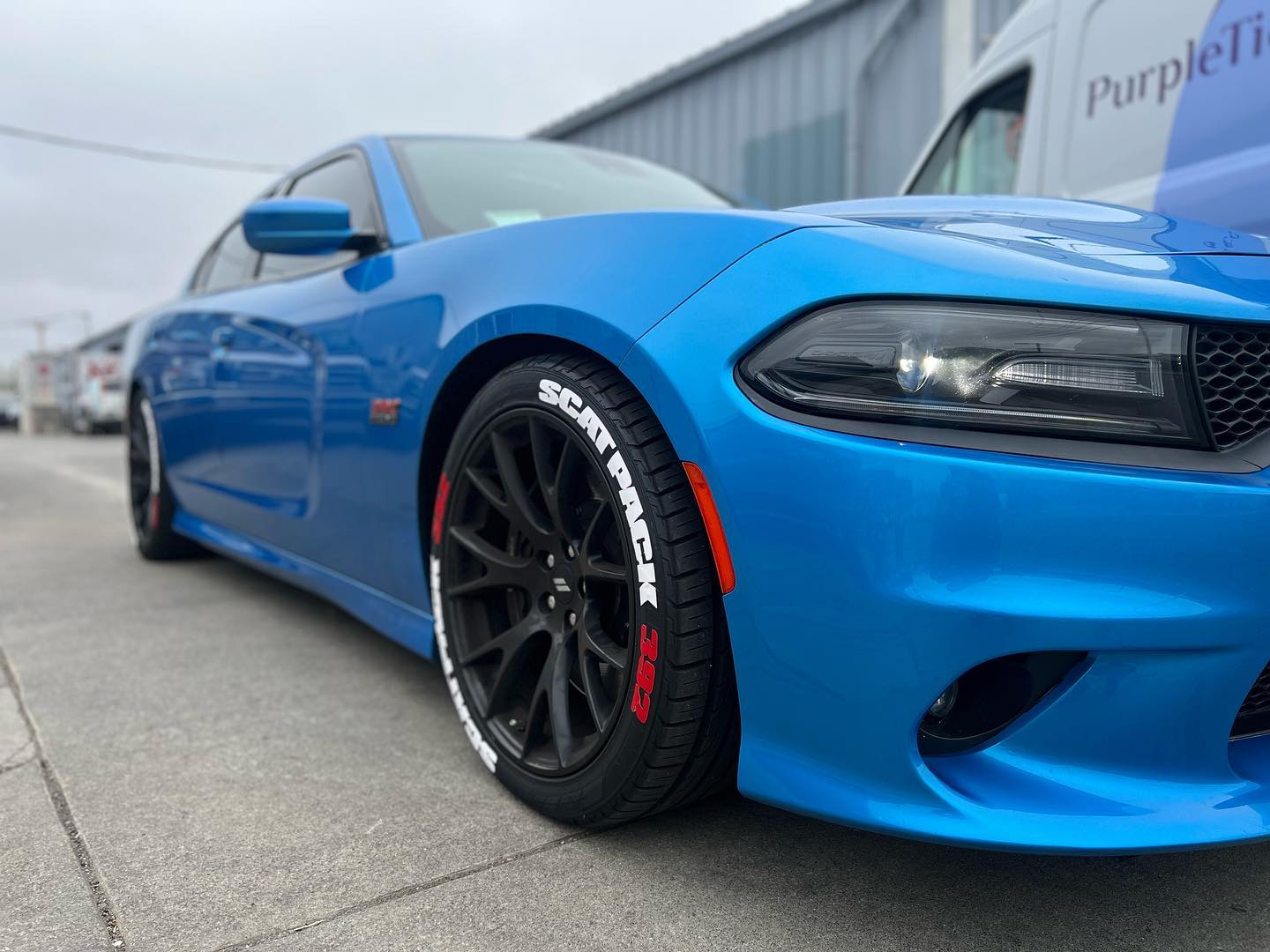Blue Dodge Charger with performance tires